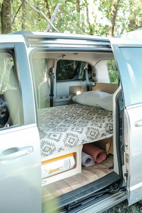 Double bed for Dodge Toyota Chrysler minivan with removable storage modules