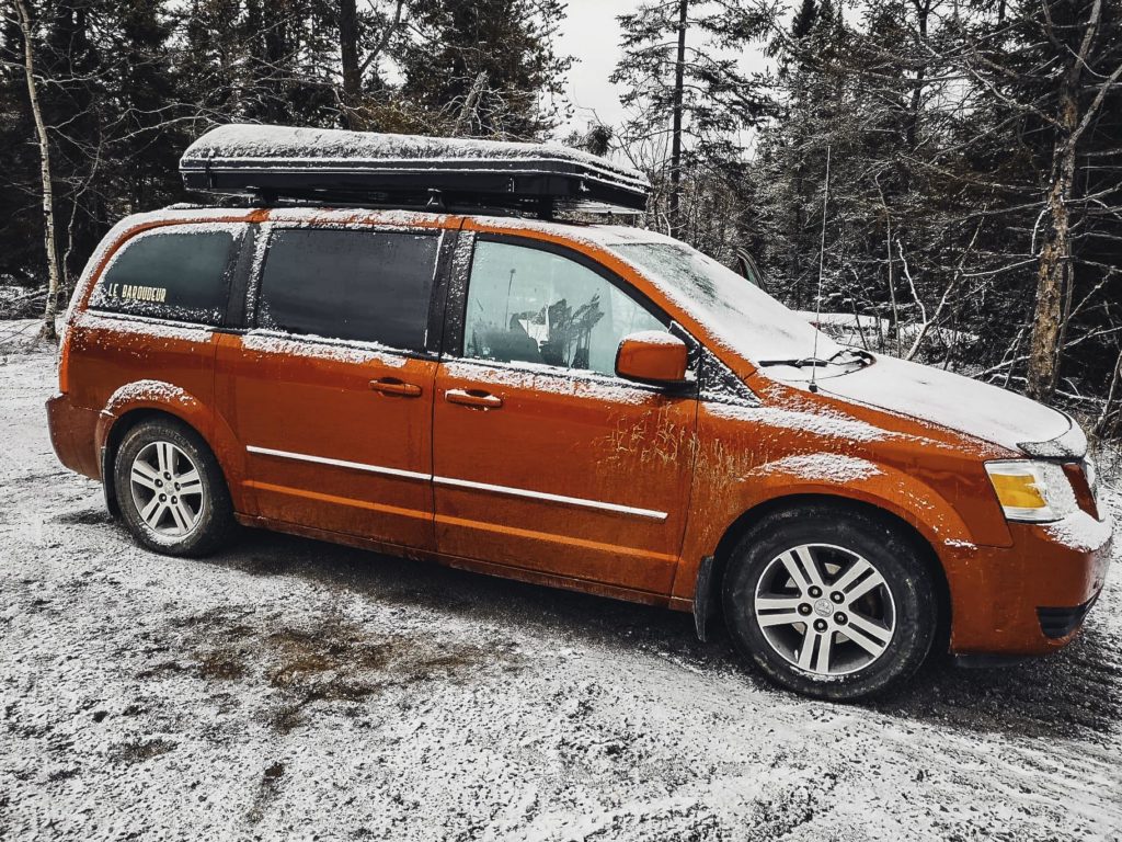 Vanpackers minivan on a winter road trip